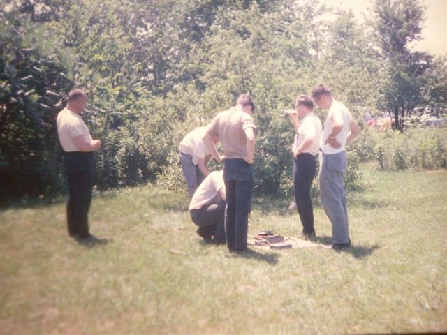The tall young guy is believed to be  Don W8IDM.  (Which one?)  Second from the right might be Hal, W8YPT, now W8PN?